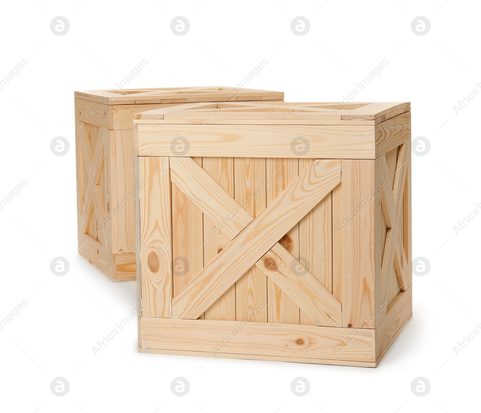 Photo of Closed new wooden crates isolated on white