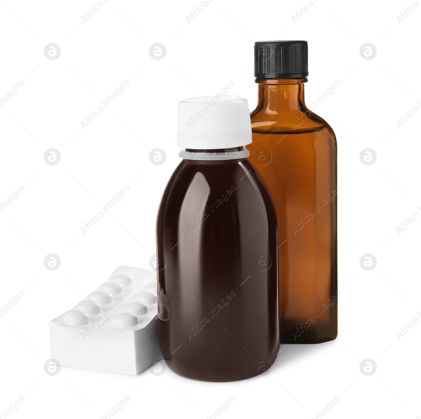 Photo of Bottles of syrups with pills on white background. Cough and cold medicine