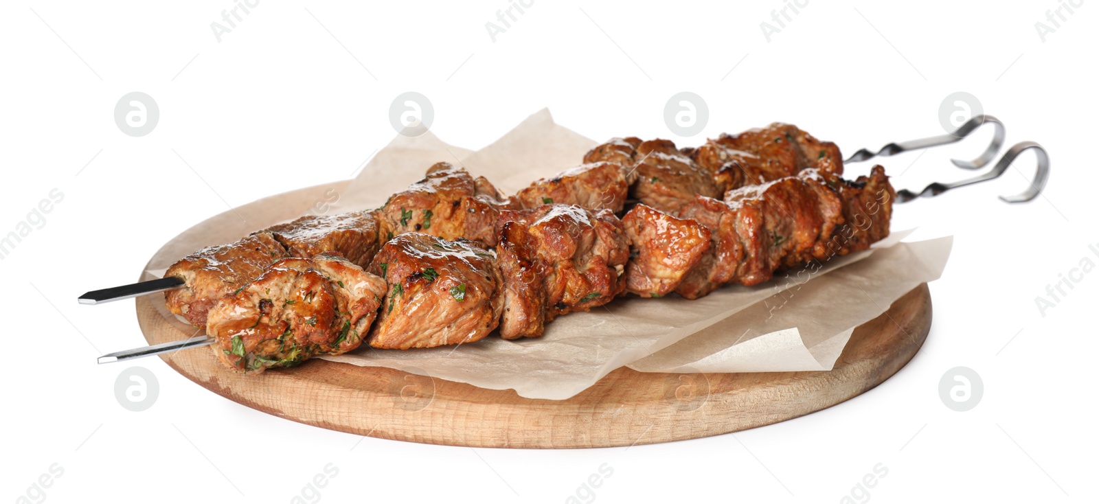 Photo of Metal skewers with delicious meat on white background