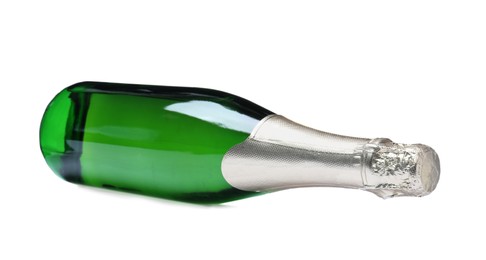 Photo of Bottle of sparkling wine isolated on white