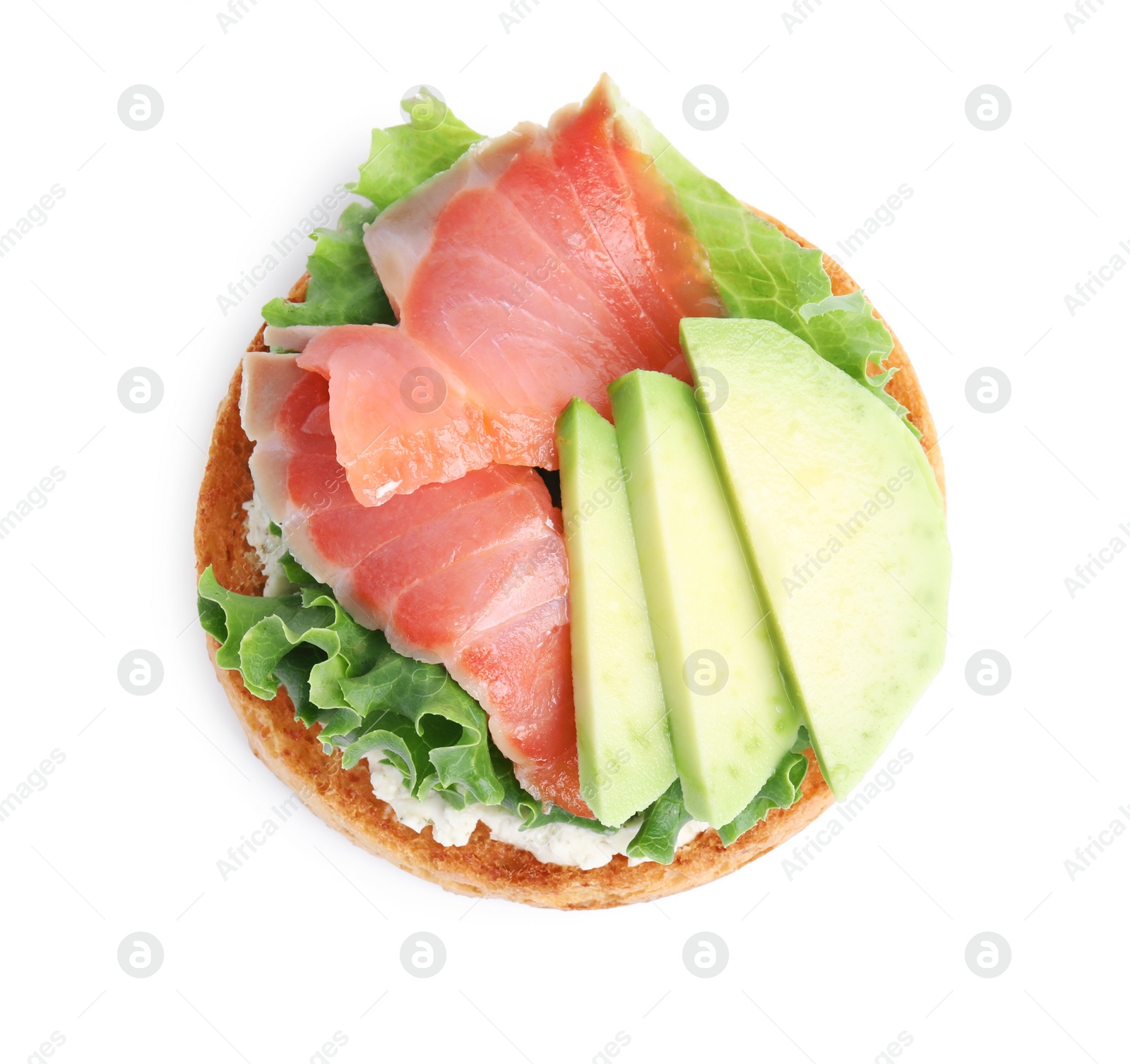 Photo of Tasty rusk with salmon, cream cheese and avocado isolated on white, top view