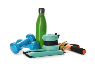 Stylish weighting agents and sport equipment on white background