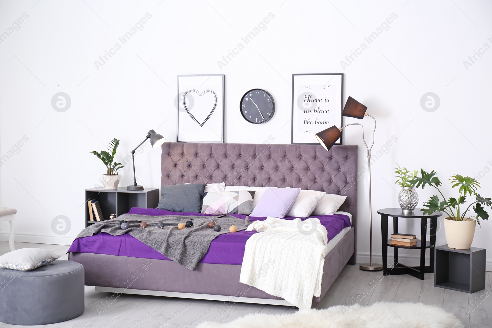 Photo of Beautiful room interior with comfortable bed