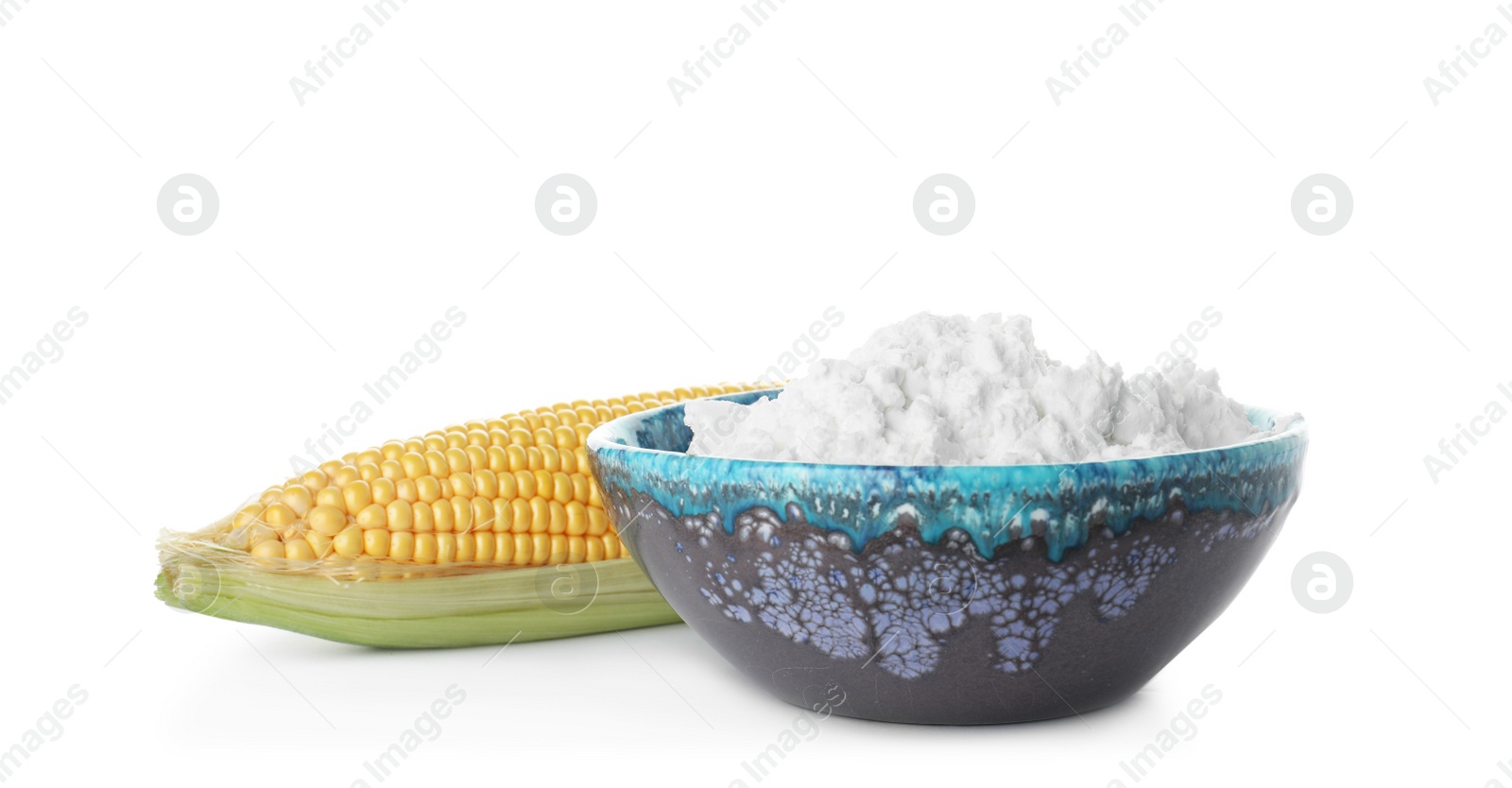 Photo of Bowl with starch and corn cob on white background