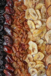 Photo of Different tasty dried fruits as background, top view