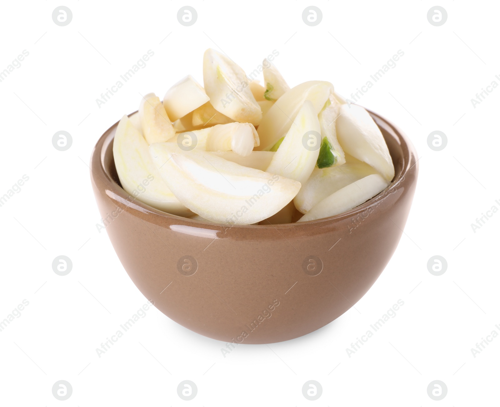 Photo of Peeled cloves of fresh garlic in bowl isolated on white