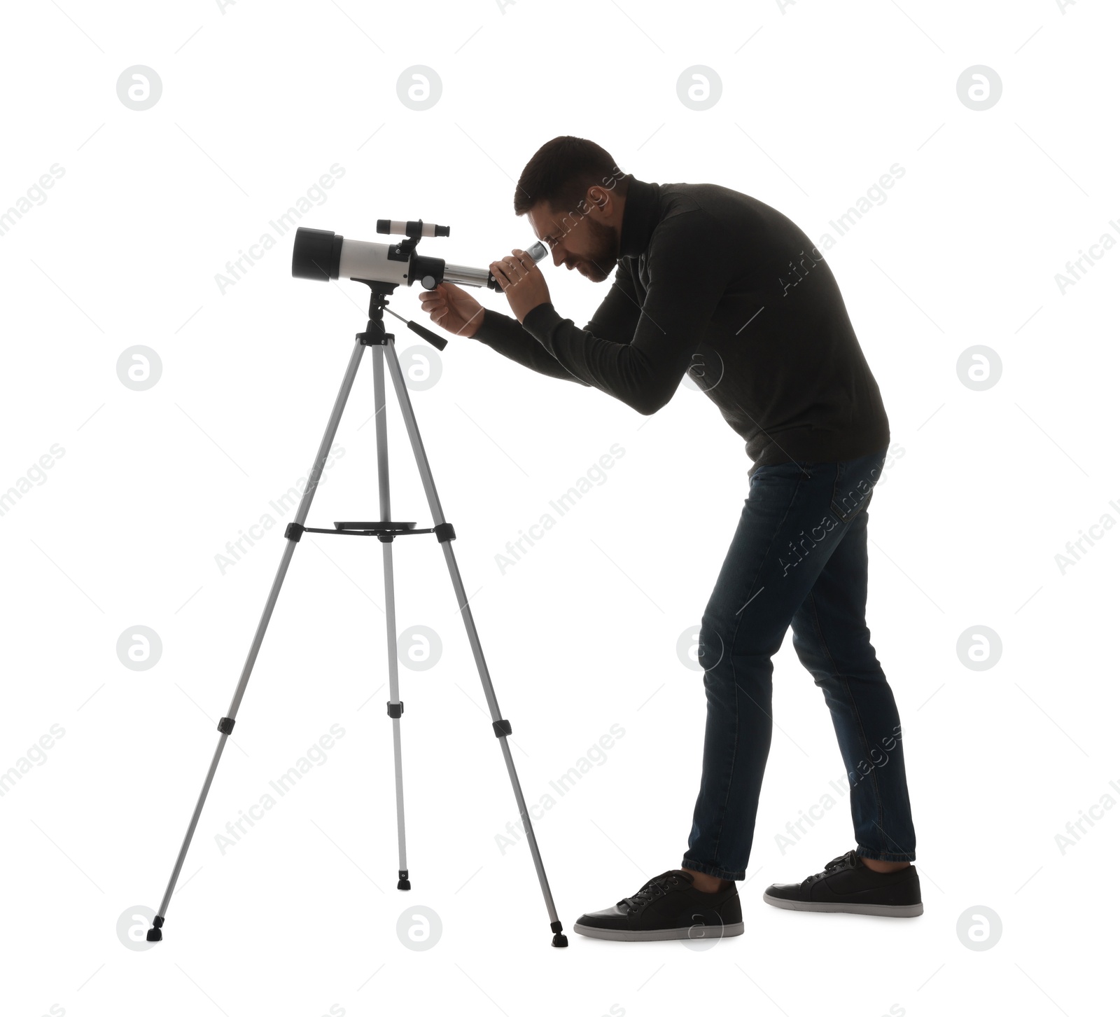 Photo of Astronomer looking at stars through telescope on white background