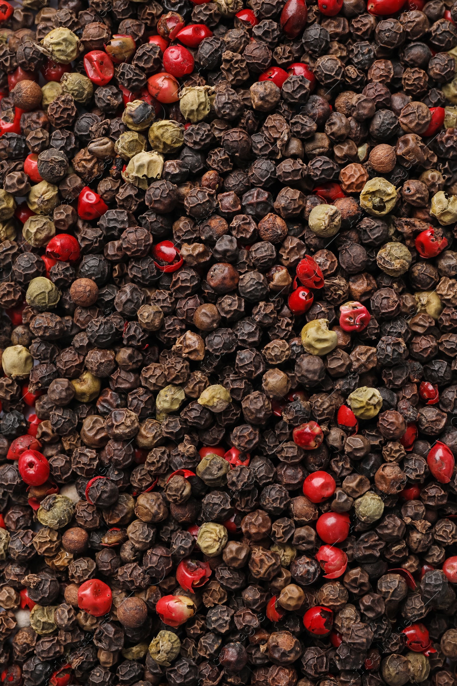 Photo of Aromatic peppercorn mix as background, top view