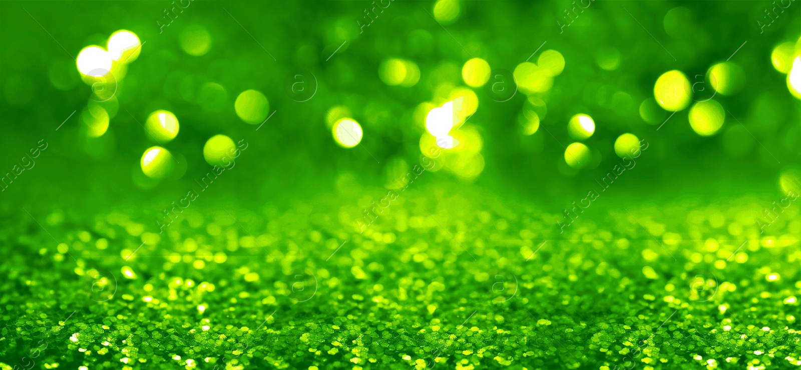 Image of St. Patrick day. Shiny green glitter, bokeh effect. Banner design