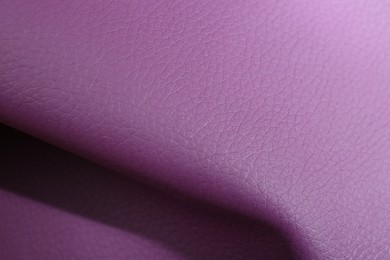 Photo of Beautiful purple leather as background, above view