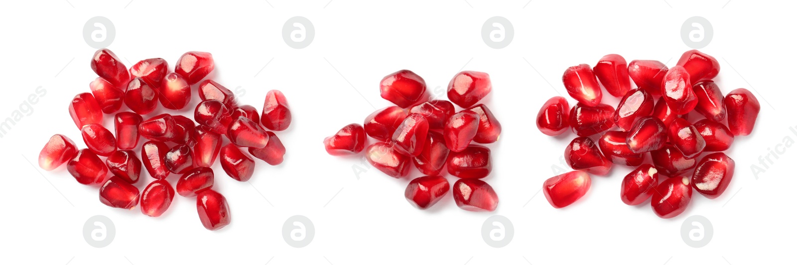 Image of Set with ripe juicy pomegranate seeds on white background, top view. Banner design