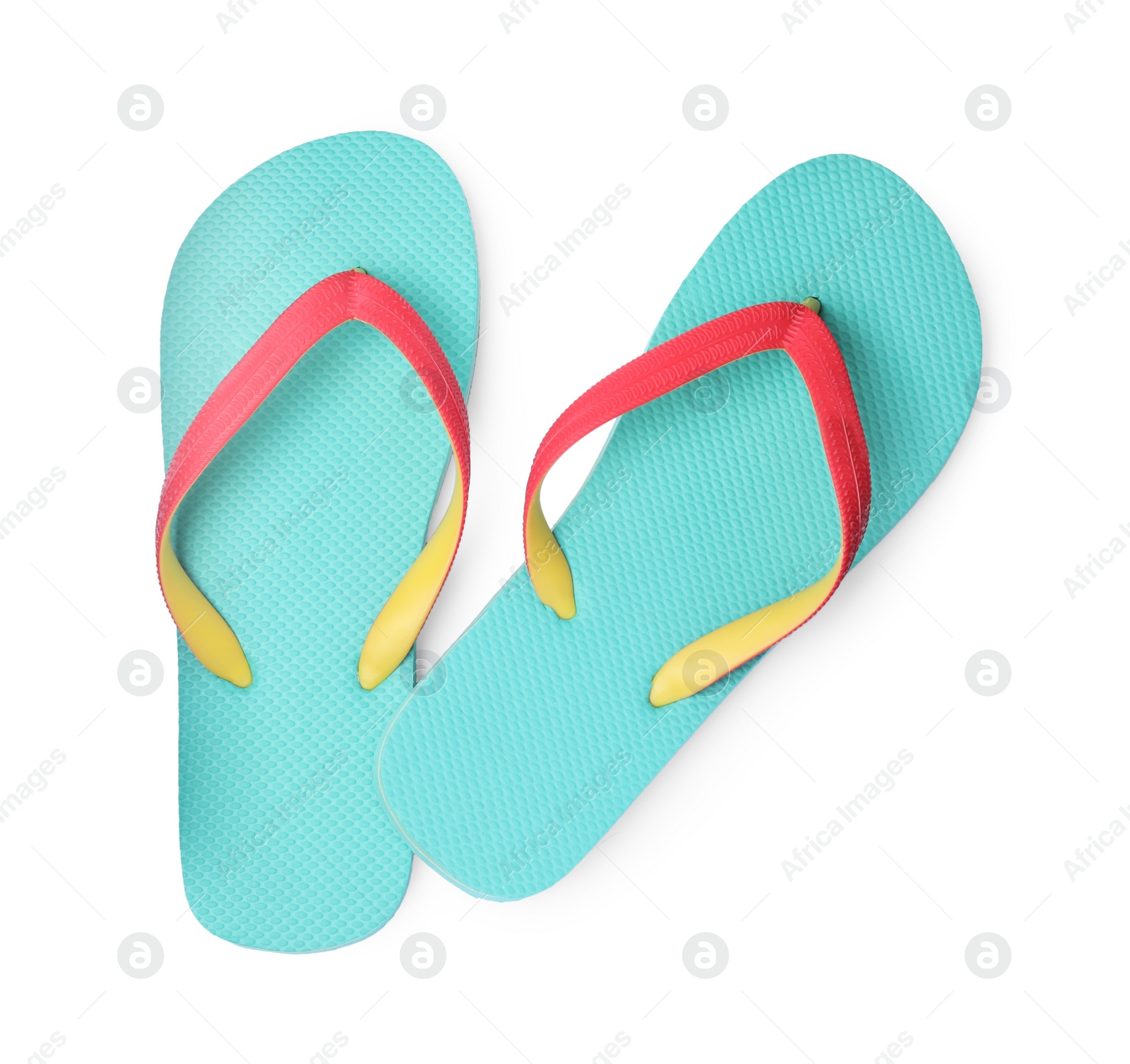 Photo of Pair of turquoise flip flops isolated on white, top view