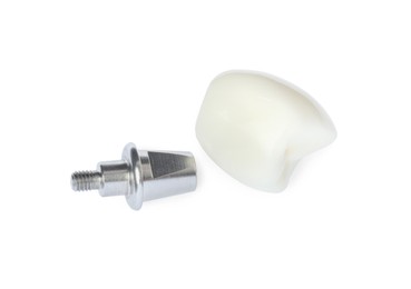 Photo of Abutment and crown of dental implant on white background, top view