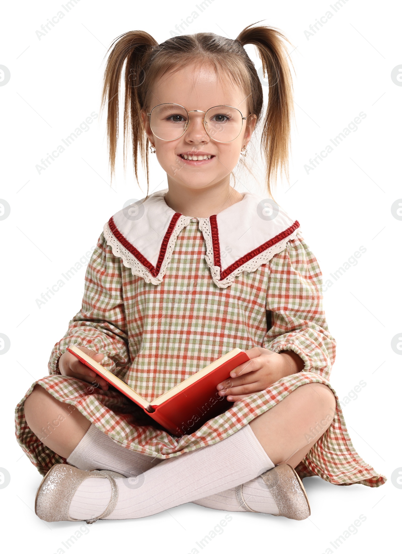 Photo of Cute little girl with book on white background