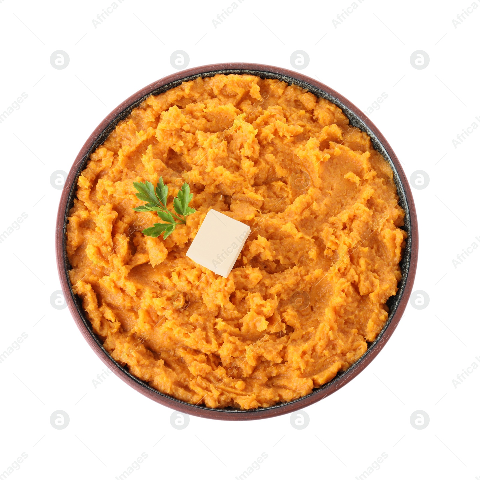 Photo of Plate with mashed sweet potatoes on white background, top view