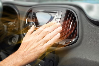 Image of Man checking work of conditioner in car and illustration of warm air flow, closeup