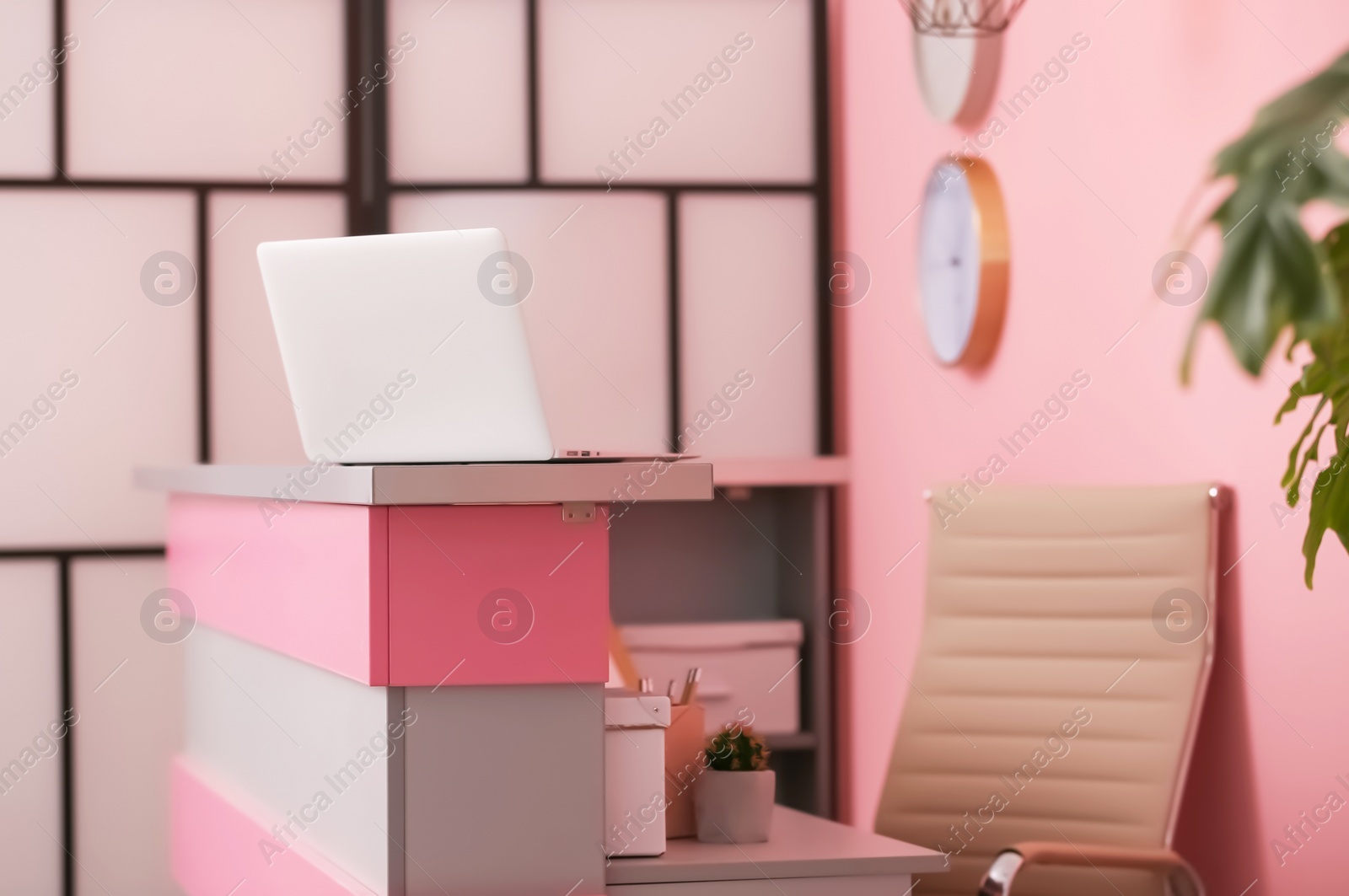 Photo of Reception desk in beauty salon. Stylish interior