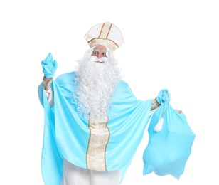 Photo of Portrait of Saint Nicholas holding sack with presents on white background