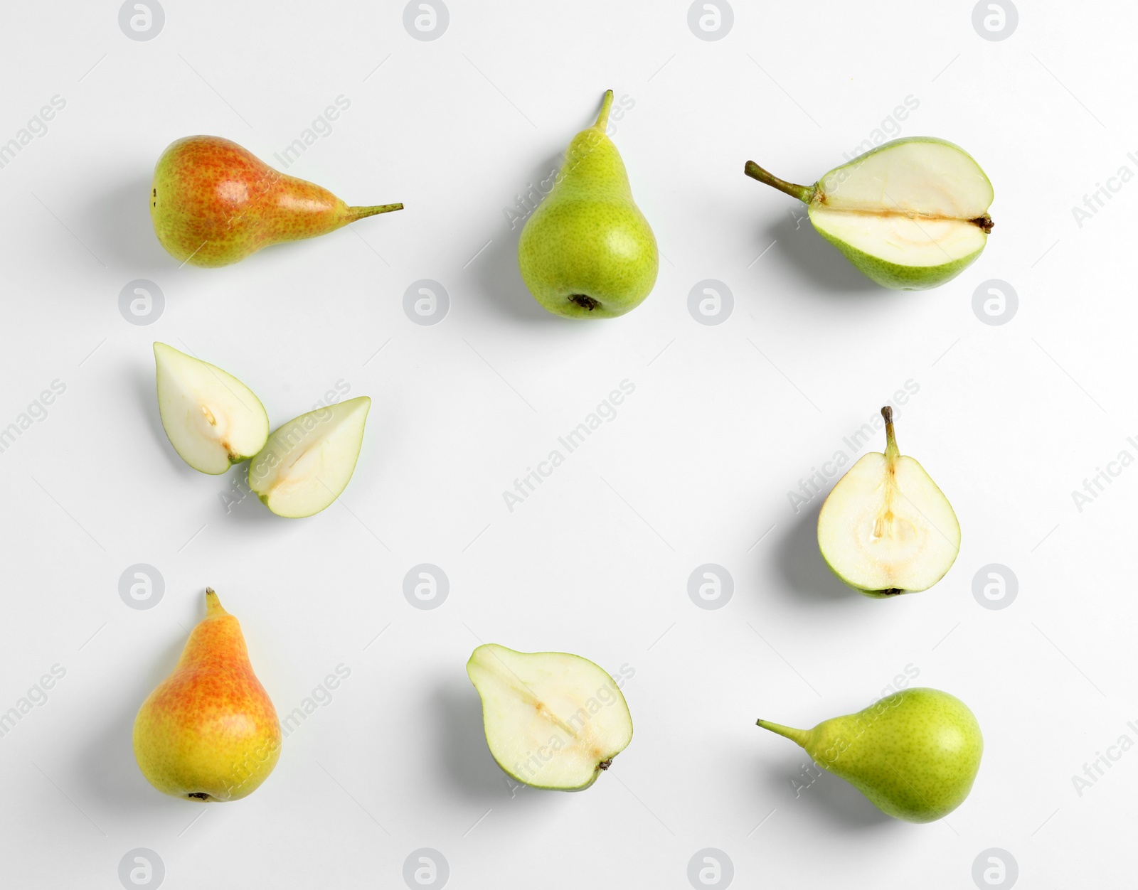 Photo of Fresh pears on light background, flat lay composition