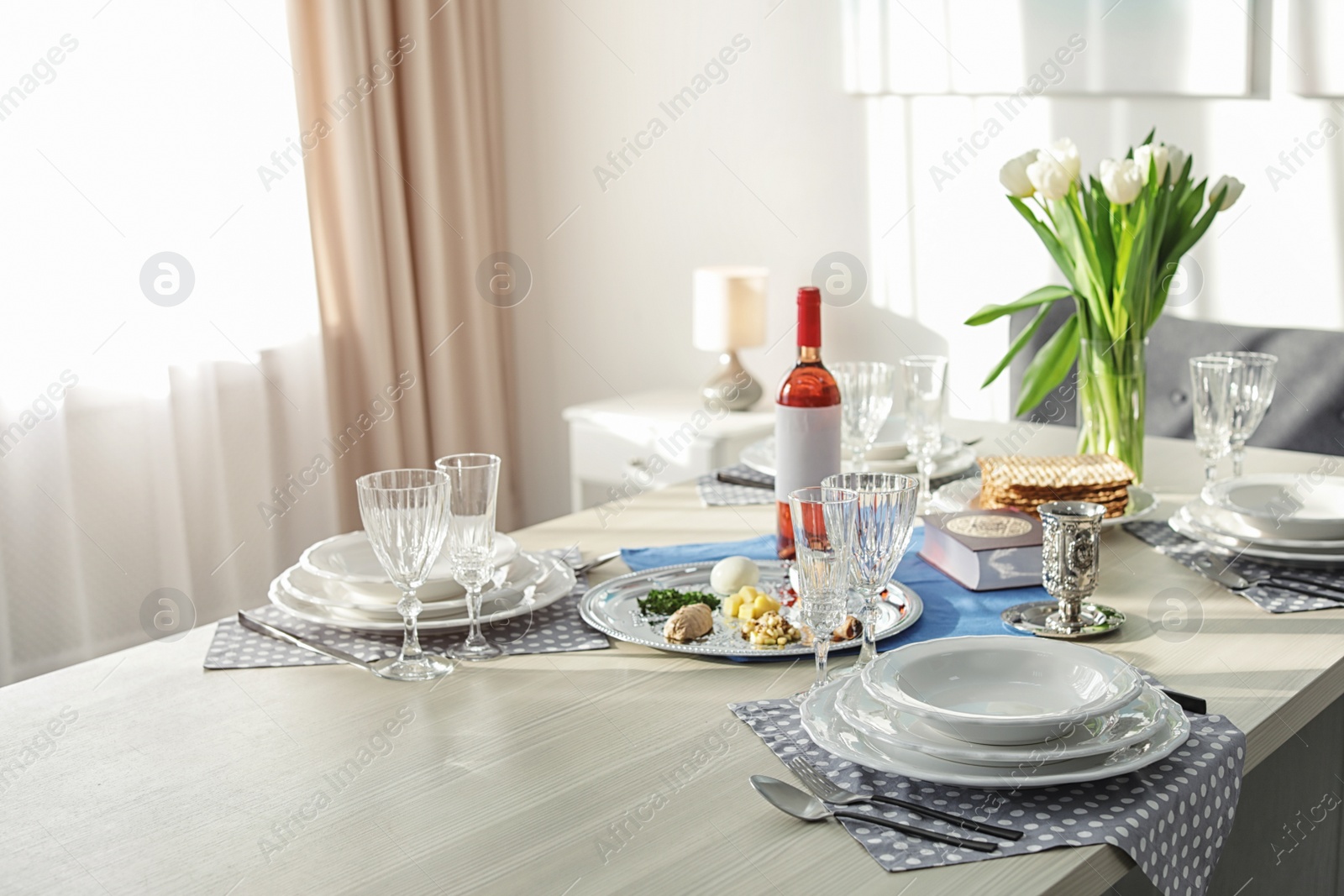 Photo of Table served for Passover (Pesach) Seder indoors, space for text