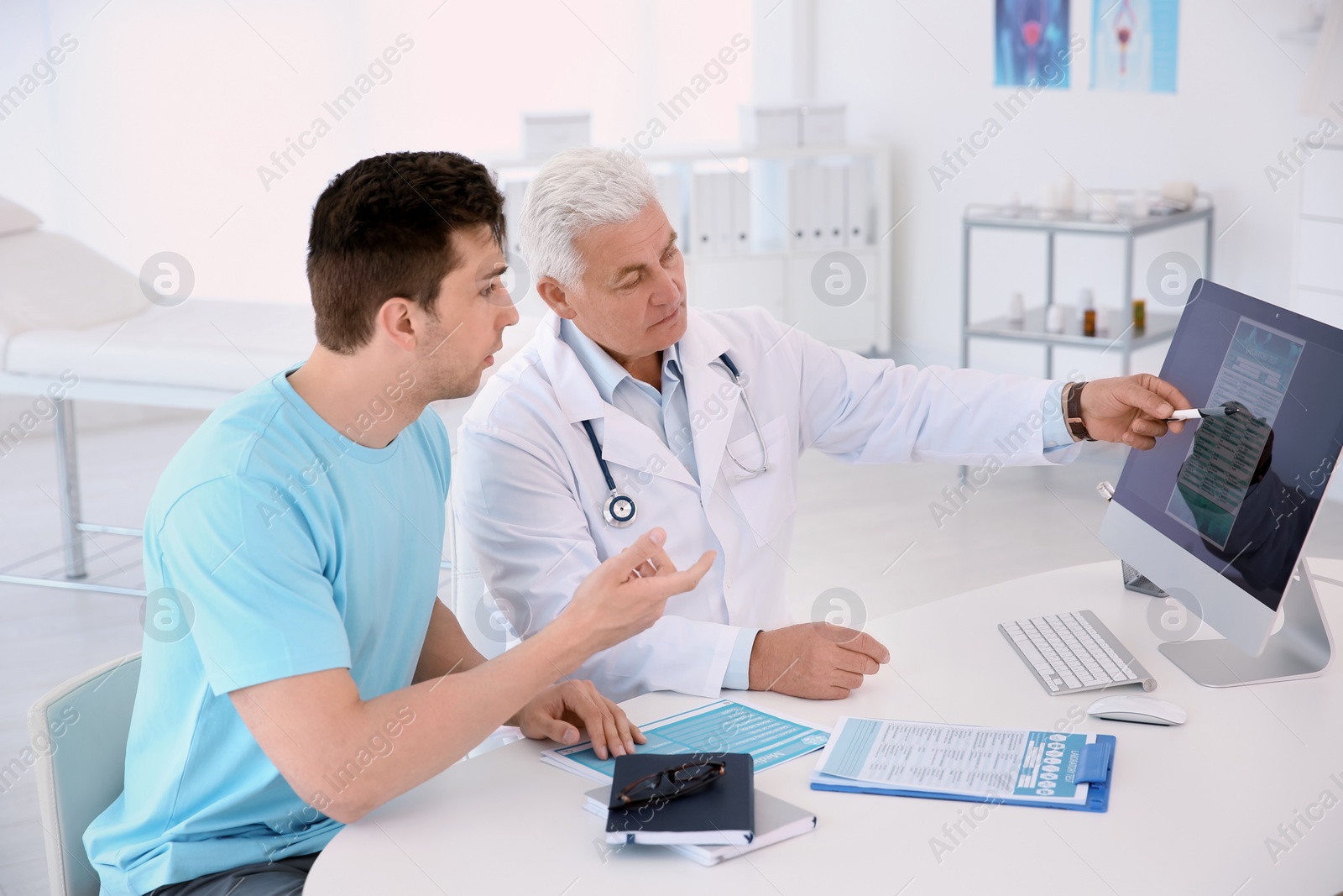 Photo of Man with health problems visiting urologist at hospital