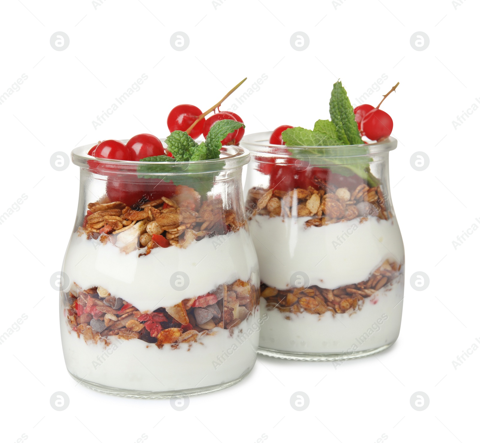 Photo of Delicious yogurt parfait with fresh red currants and mint on white background
