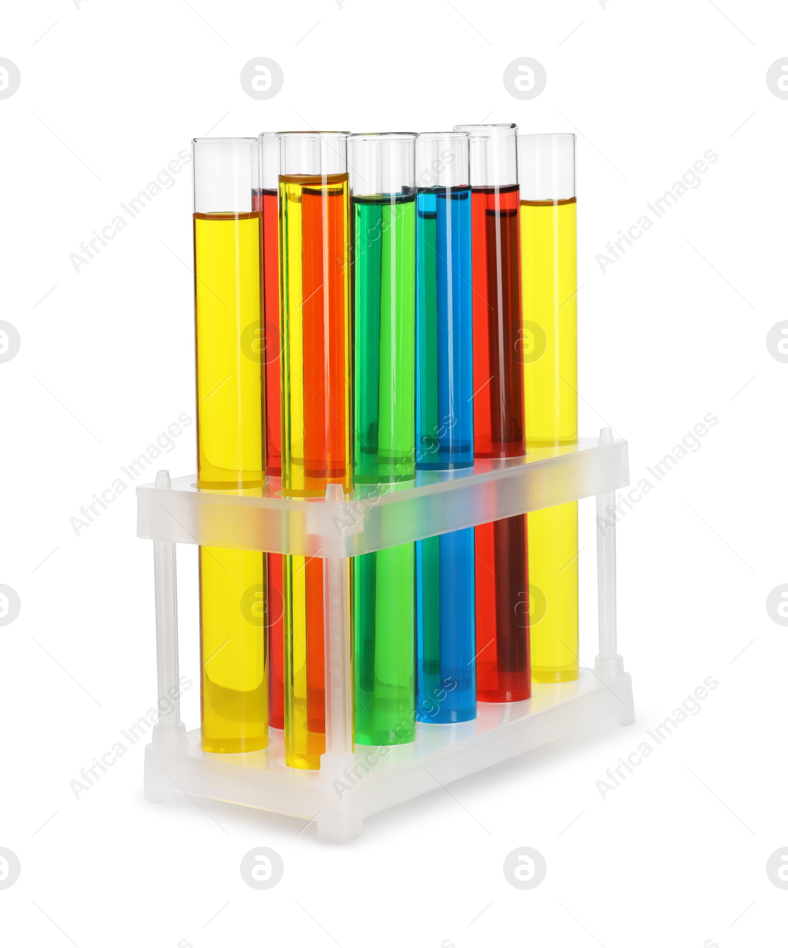 Photo of Many test tubes with colorful liquids in stand isolated on white