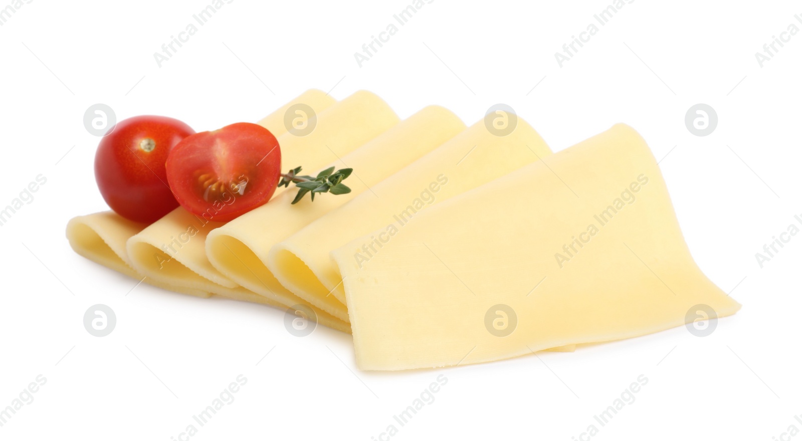 Photo of Slices of tasty fresh cheese, thyme and tomatoes isolated on white