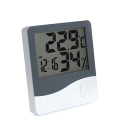 Photo of Digital hygrometer and thermometer with clock isolated on white