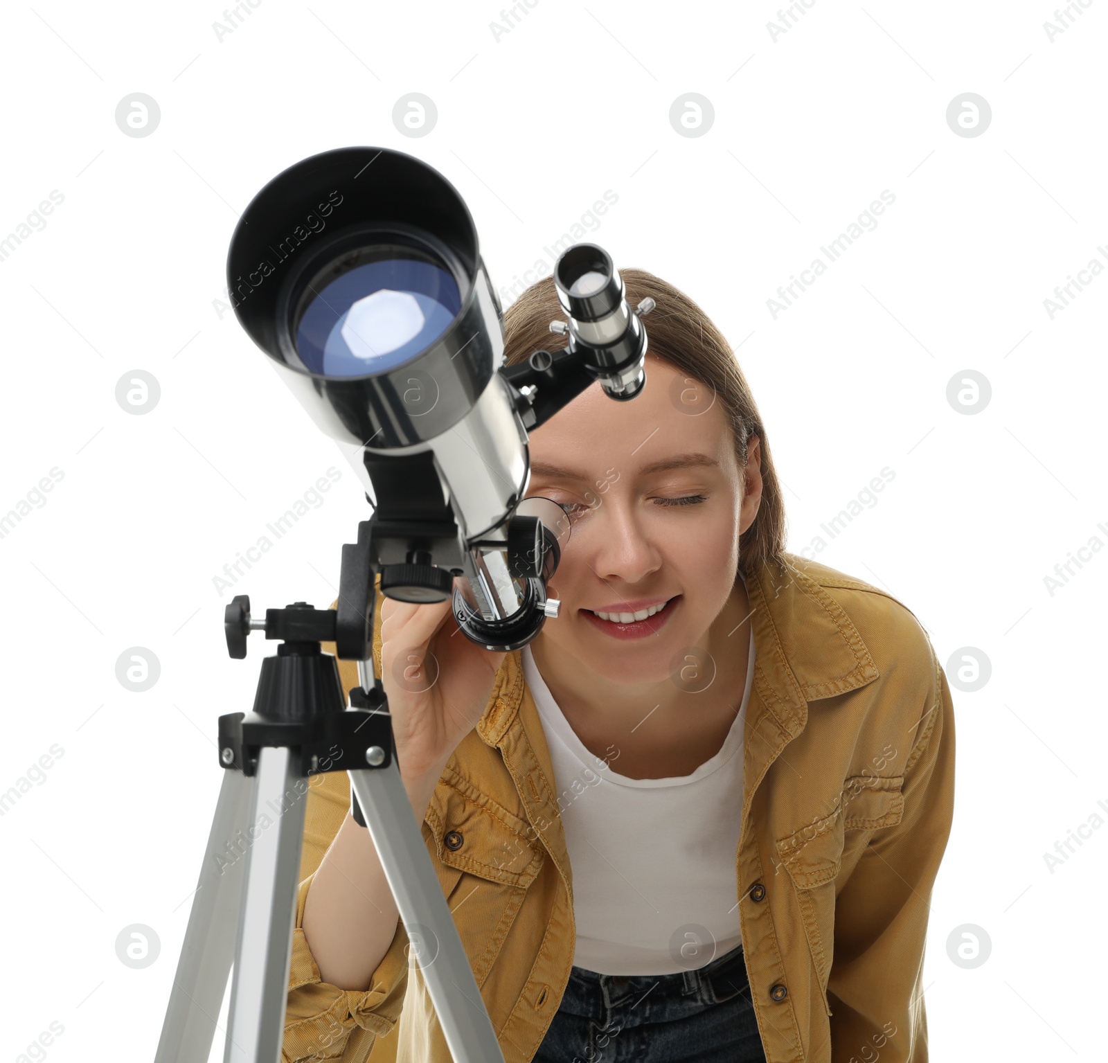 Photo of Young astronomer looking at stars through telescope on white background