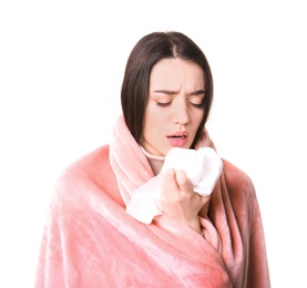 Photo of Young woman with cold sneezing on white background