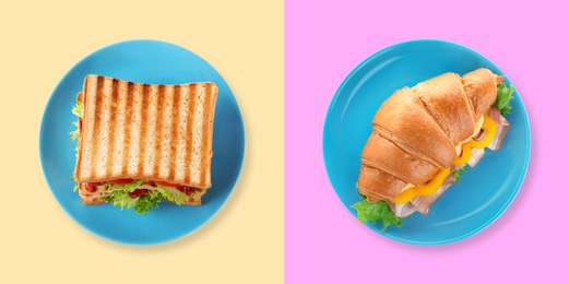 Yummy sandwich and croissant on color background, top view