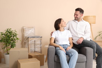 Photo of Happy couple in new apartment. Moving day