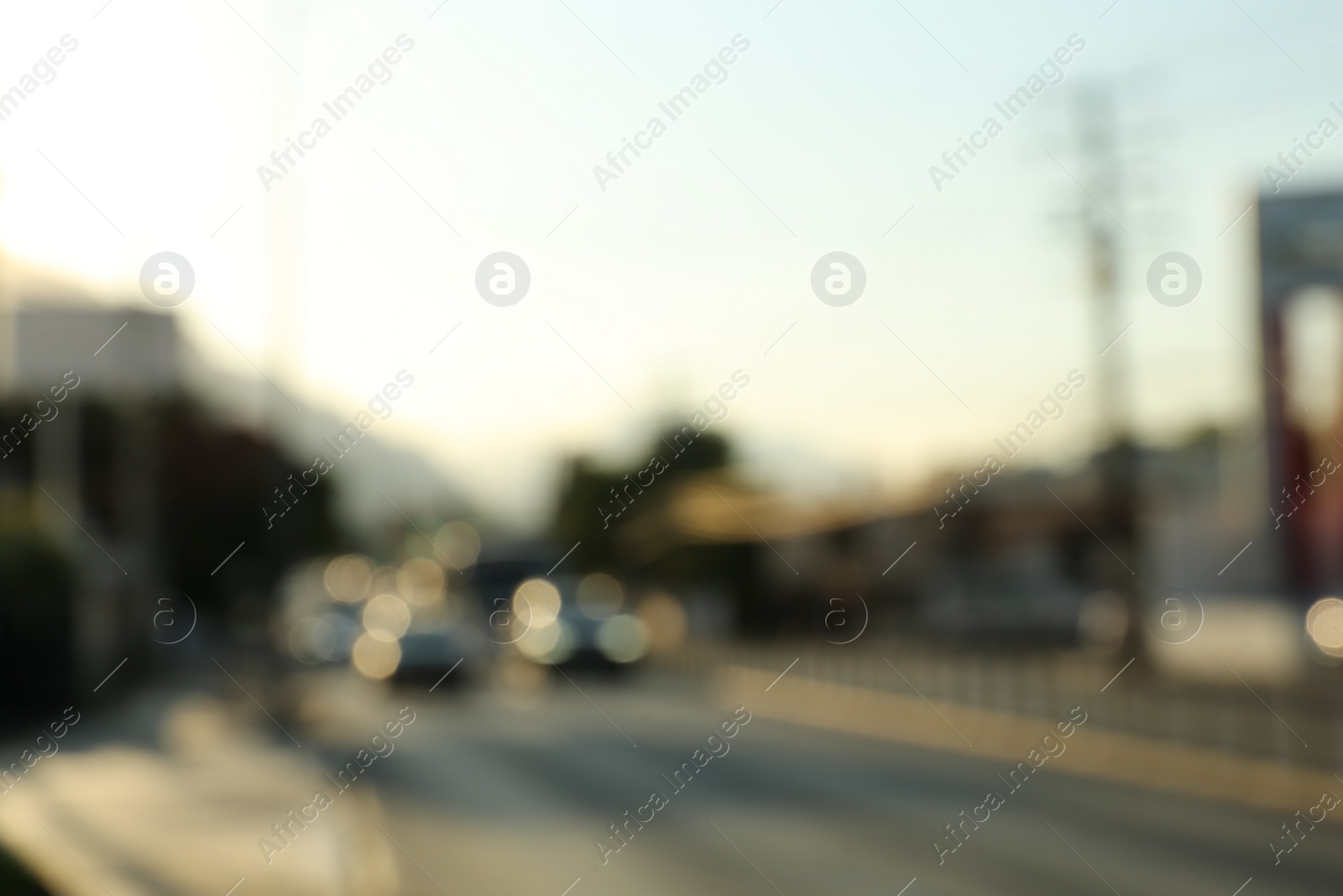 Photo of Blurred view of road with cars, bokeh effect