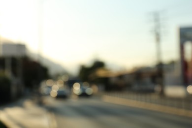 Blurred view of road with cars, bokeh effect