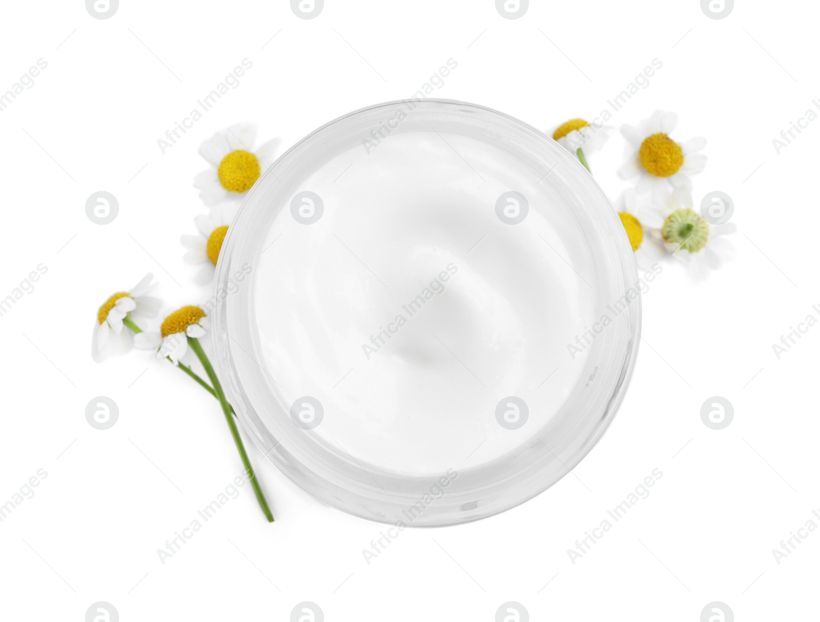 Photo of Jar of body cream with camomile flowers on white background, top view