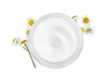 Jar of body cream with camomile flowers on white background, top view