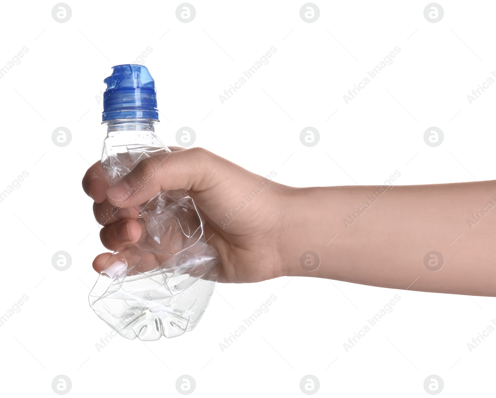 Photo of Woman holding crumpled bottle on white background, closeup. Plastic recycling