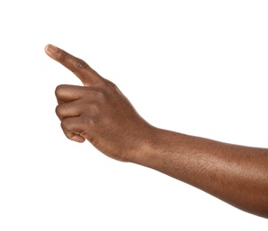 Photo of African-American man pointing at something on white background, closeup