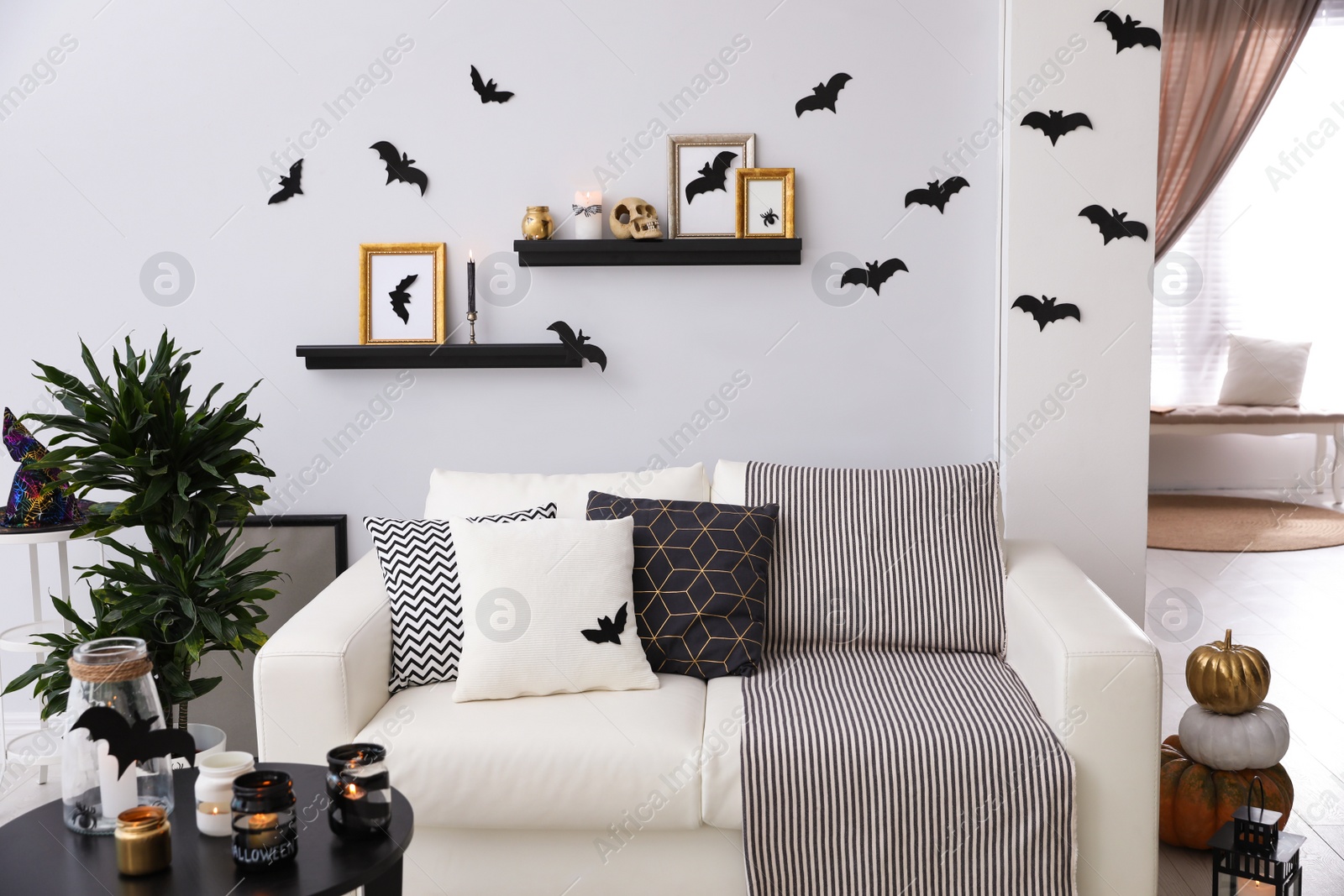 Photo of Modern room decorated for Halloween. Idea for festive interior