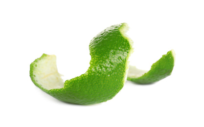 Peel of fresh ripe lime isolated on white