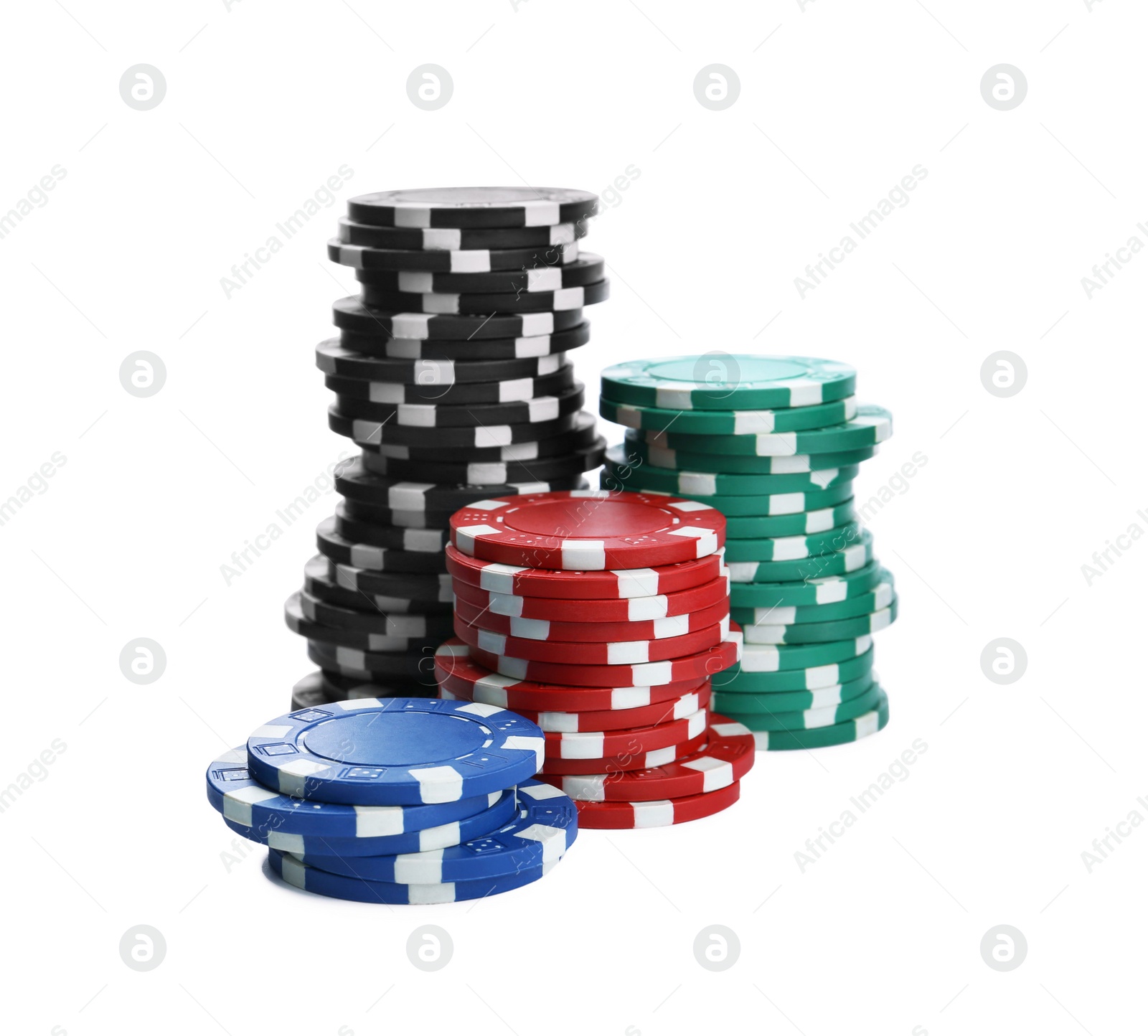 Photo of Plastic casino chips stacked on white background. Poker game