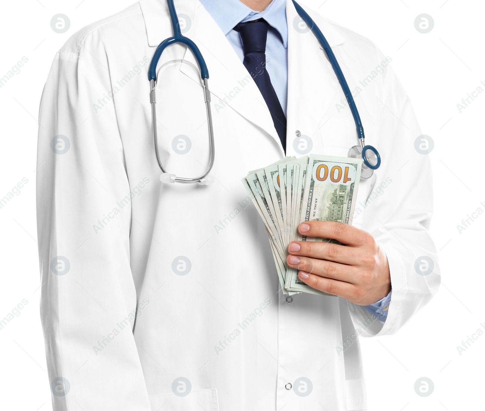 Photo of Doctor with bribe on white background, closeup. Corruption in medicine