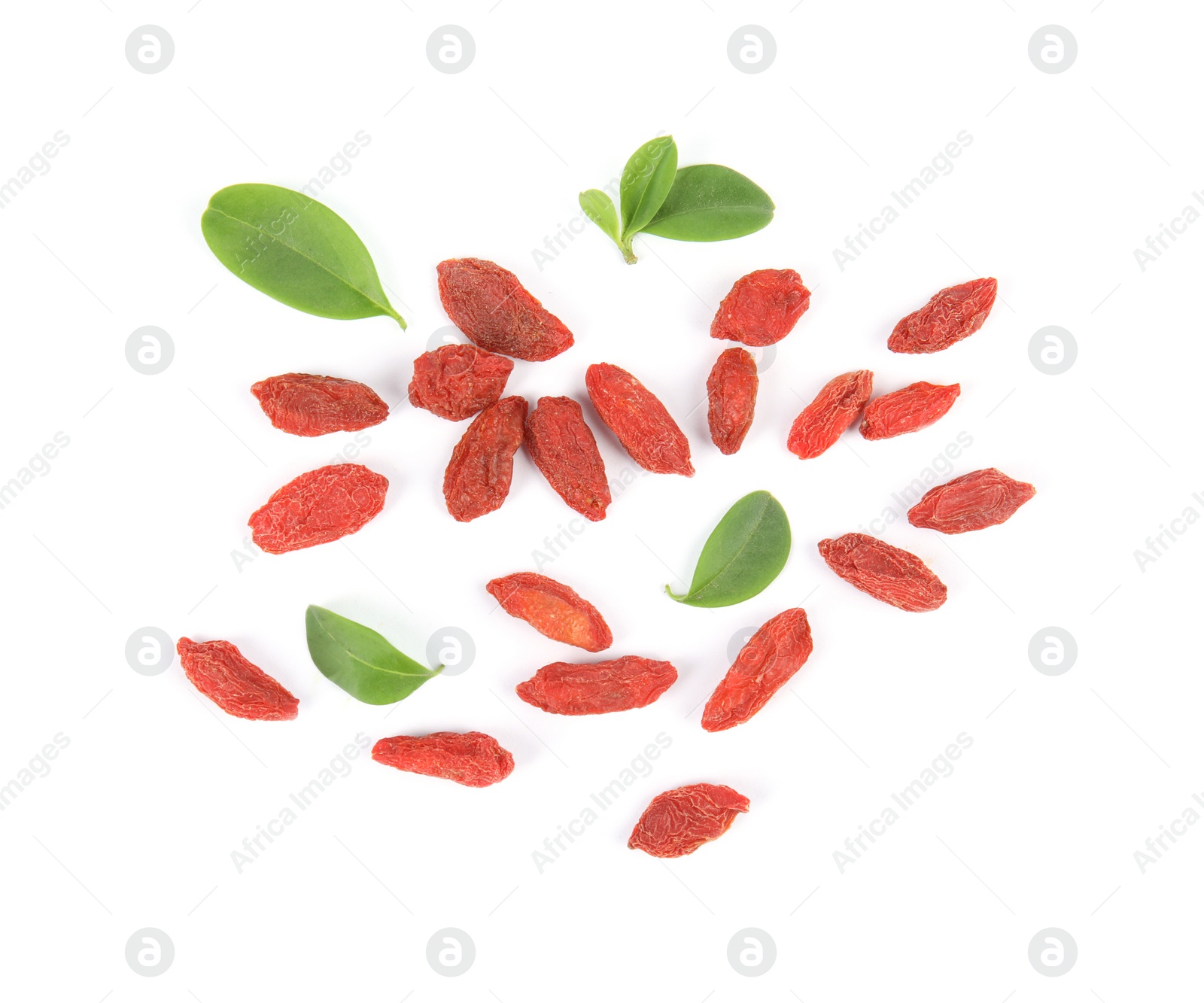 Photo of Tasty dried goji berries and leaves on white background, top view