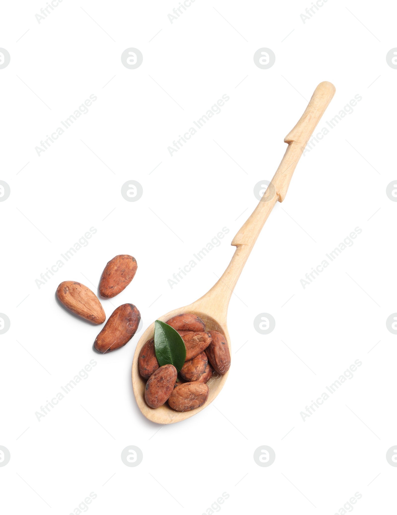 Photo of Wooden spoon with cocoa beans and leaf isolated on white, top view