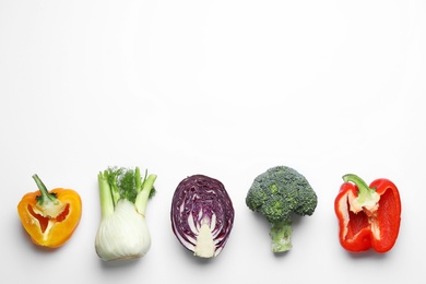 Photo of Flat lay composition with fresh ripe vegetables on white background