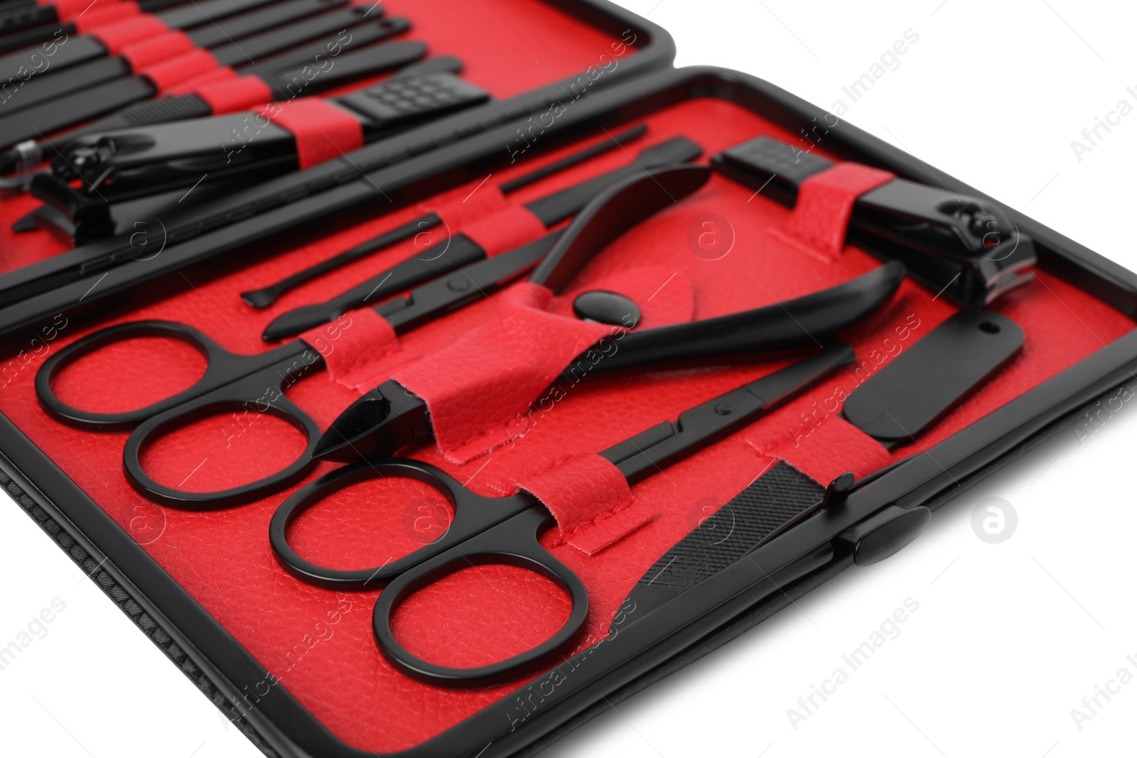 Photo of Manicure set in case on white background, closeup