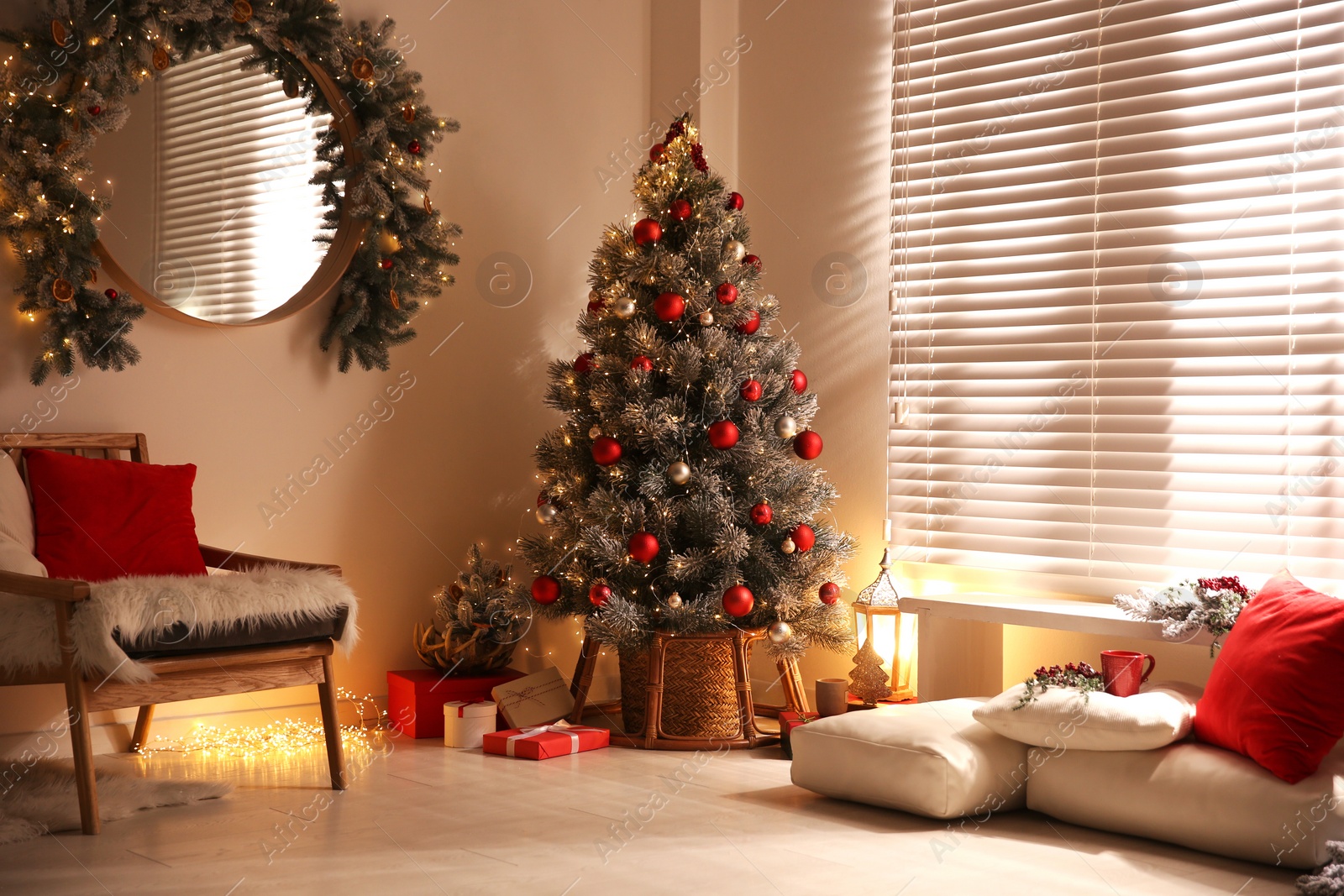 Photo of Beautiful decorated Christmas tree in festive room interior