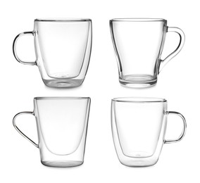 Set with different empty glass coffee cups on white background 