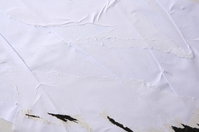 Photo of Texture of ripped paper poster, closeup view